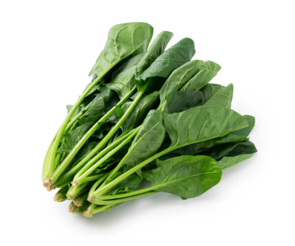 Fresh spinach on a white background